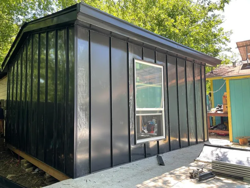 Black standing seam metal wall panels for Roof Inspection in Oak Creek