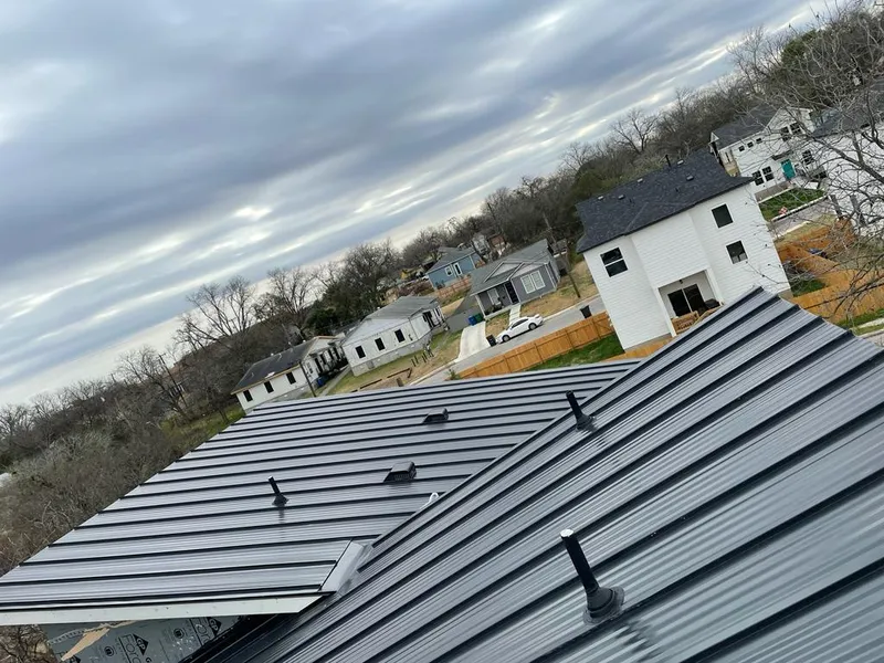 Standing seam metal roof panels with vents for Skylight Repair in Oak Creek